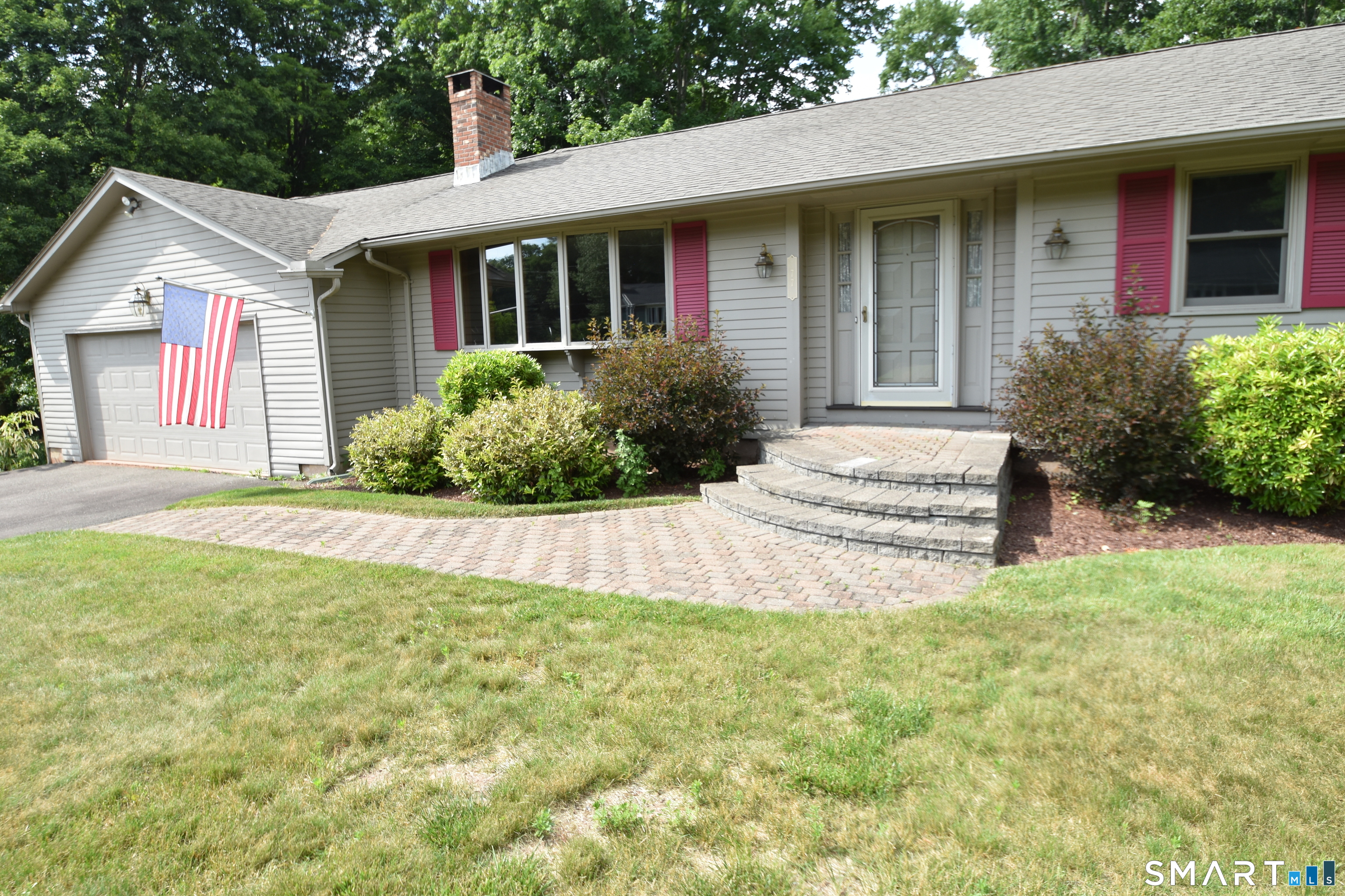 77 Winthrop Road Manchester, CT 06040 - Photo 2 of 17 Paver walkway and steps to front entry