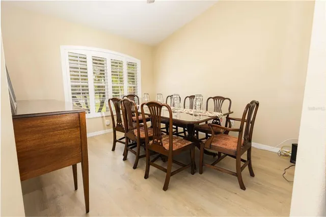 a bed room with a bed and a chair