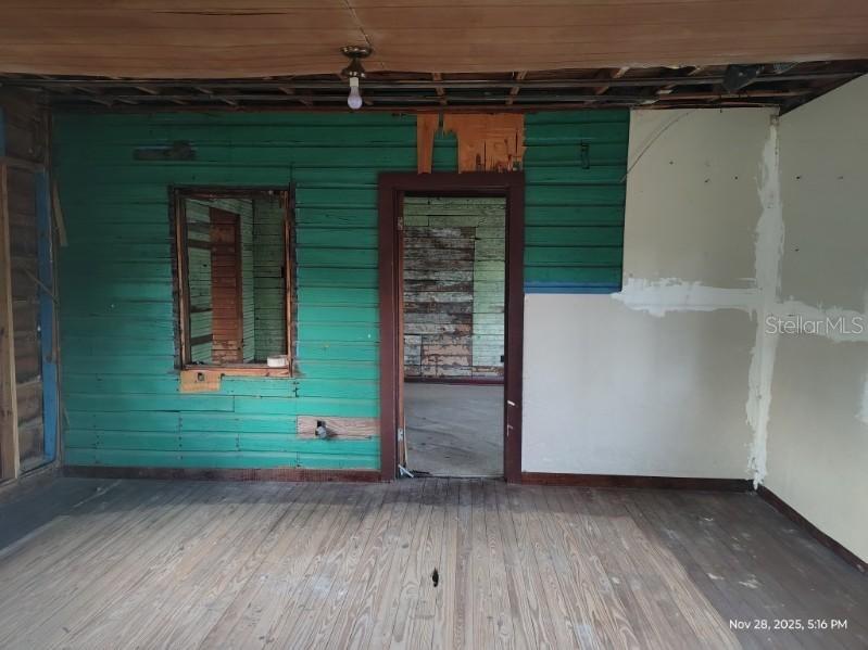 823 South Warner Avenue Perry, FL 32348 - Photo 12 of 30 an entrance to house with wooden floor