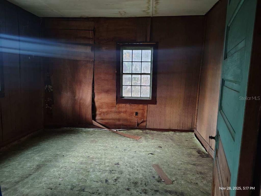 823 South Warner Avenue Perry, FL 32348 - Photo 16 of 30 a view of an empty room with a window