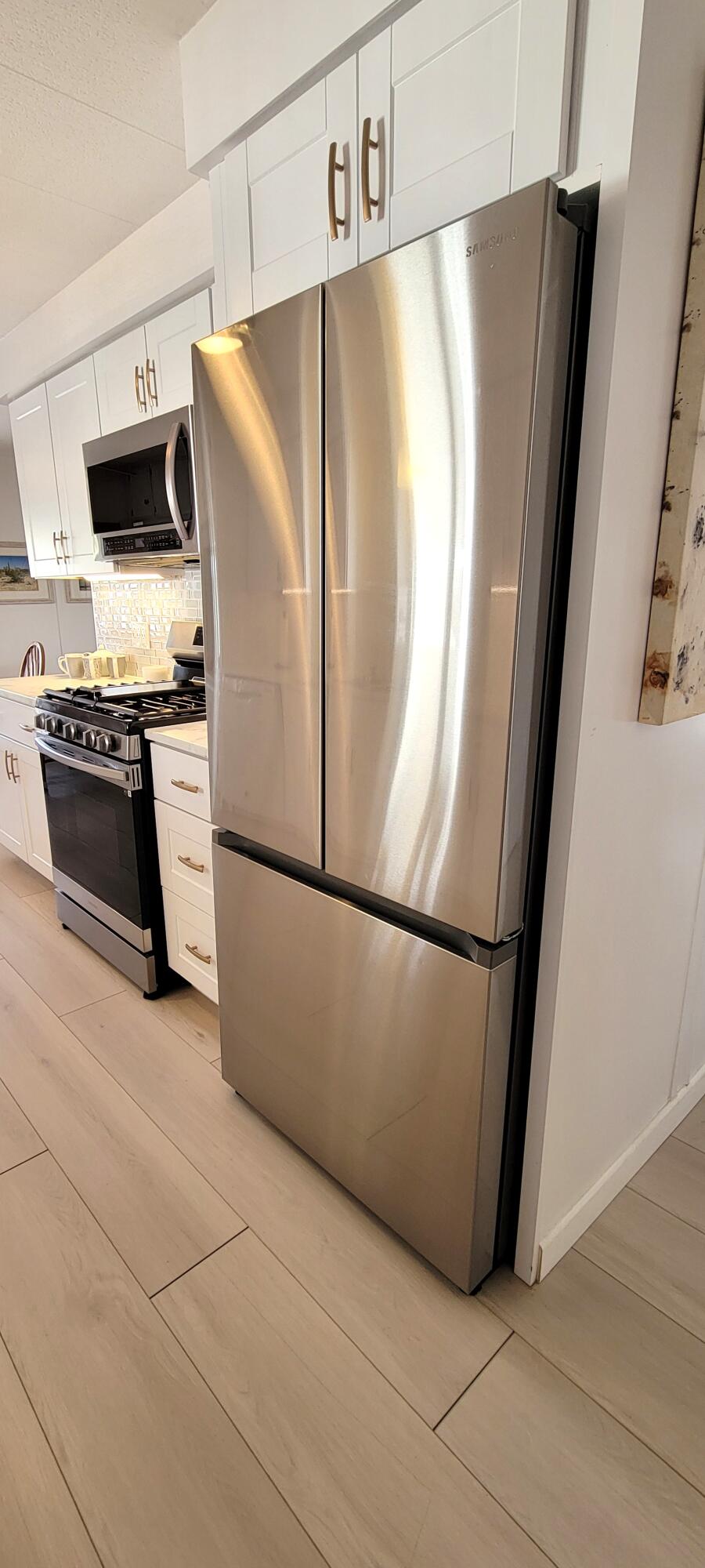 244 Standing Bear Cathedral City, CA 92234 - Photo 17 of 76 KITCHEN REFRIGERATOR FULL