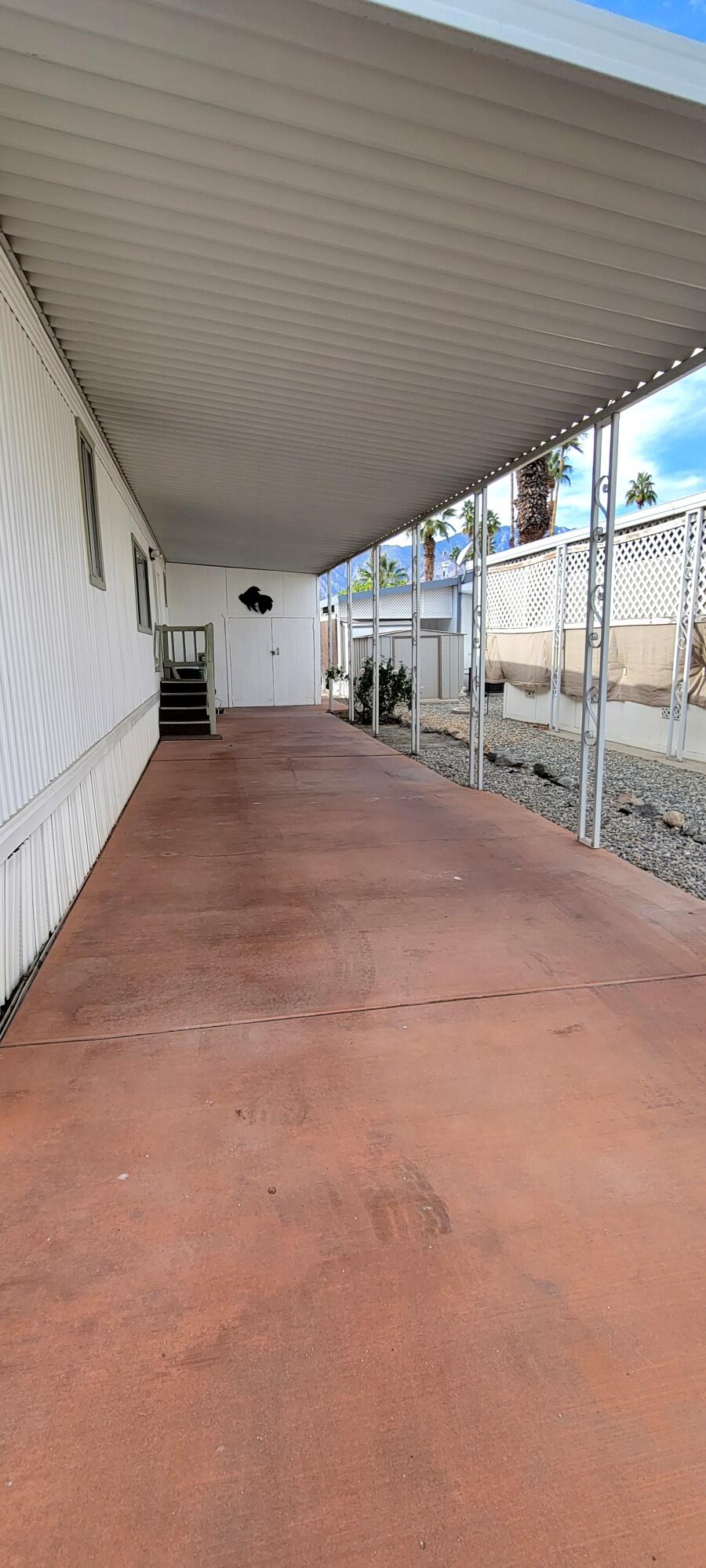 244 Standing Bear Cathedral City, CA 92234 - Photo 46 of 76 CARPORT WITH SHED