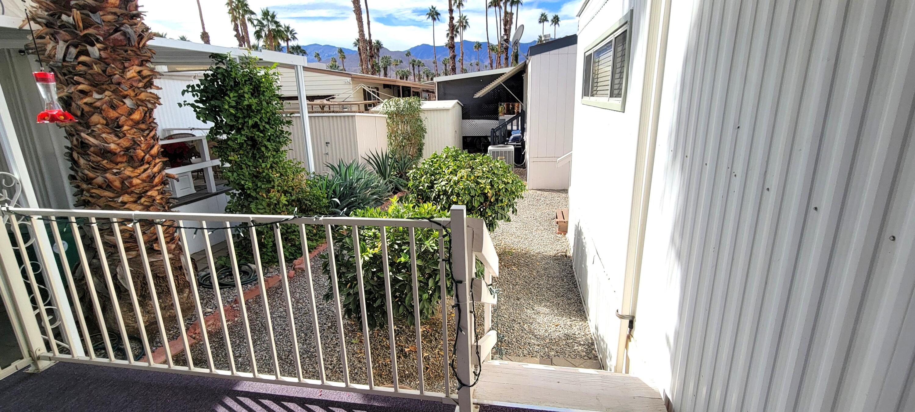 244 Standing Bear Cathedral City, CA 92234 - Photo 5 of 76 BACK STEPS FROM COVERED PATIO