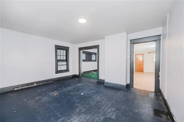 an empty room with windows