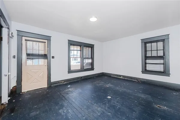 an empty room with windows