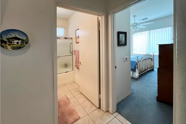 a view of hallway with livingroom and bedroom
