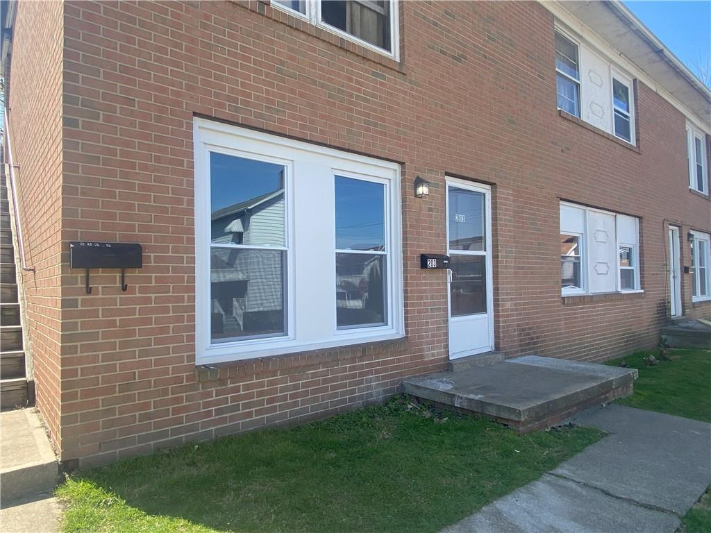 203 Irving Avenue Latrobe, PA 15650 - Photo 2 of 17 a view of outdoor space yard and front view of a house