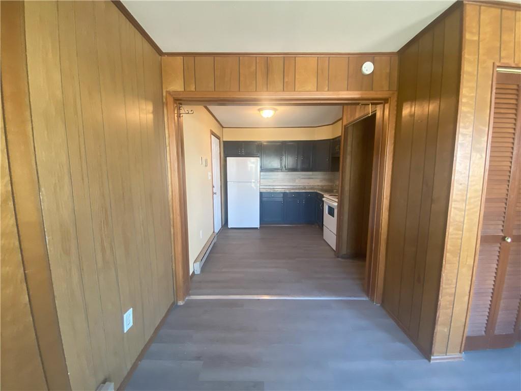 203 Irving Avenue Latrobe, PA 15650 - Photo 3 of 17 a view of entryway with kitchen and wooden floor