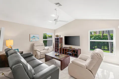 a living room with furniture and a couch