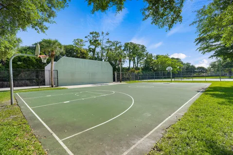 an aerial view of a pool patio swimming pool and outdoor seating