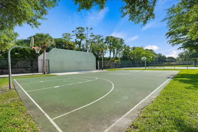 an aerial view of a pool patio swimming pool and outdoor seating