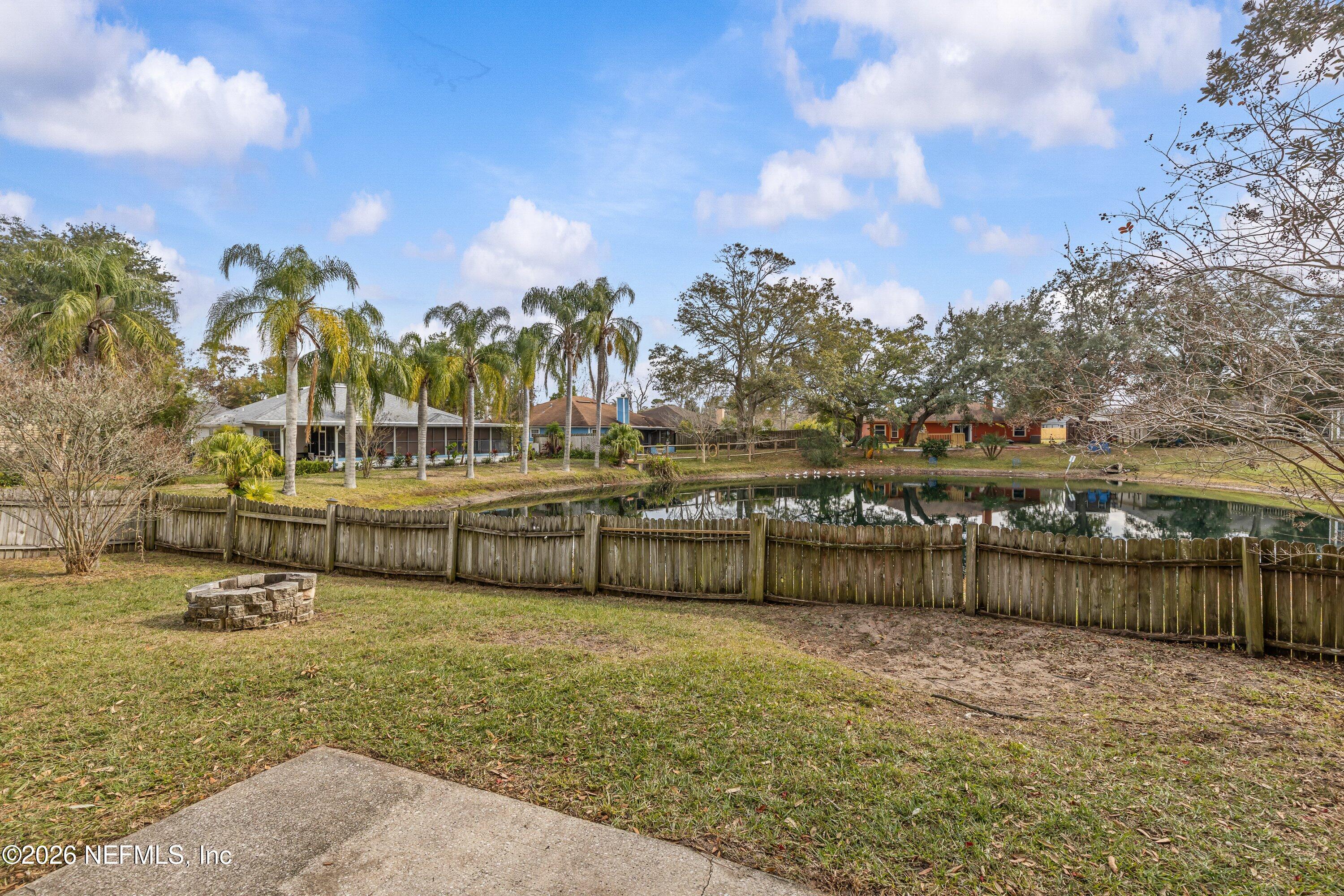 12558 Fallohide Lane Jacksonville, FL 32225 - Photo 31 of 39 a view of a lake with houses