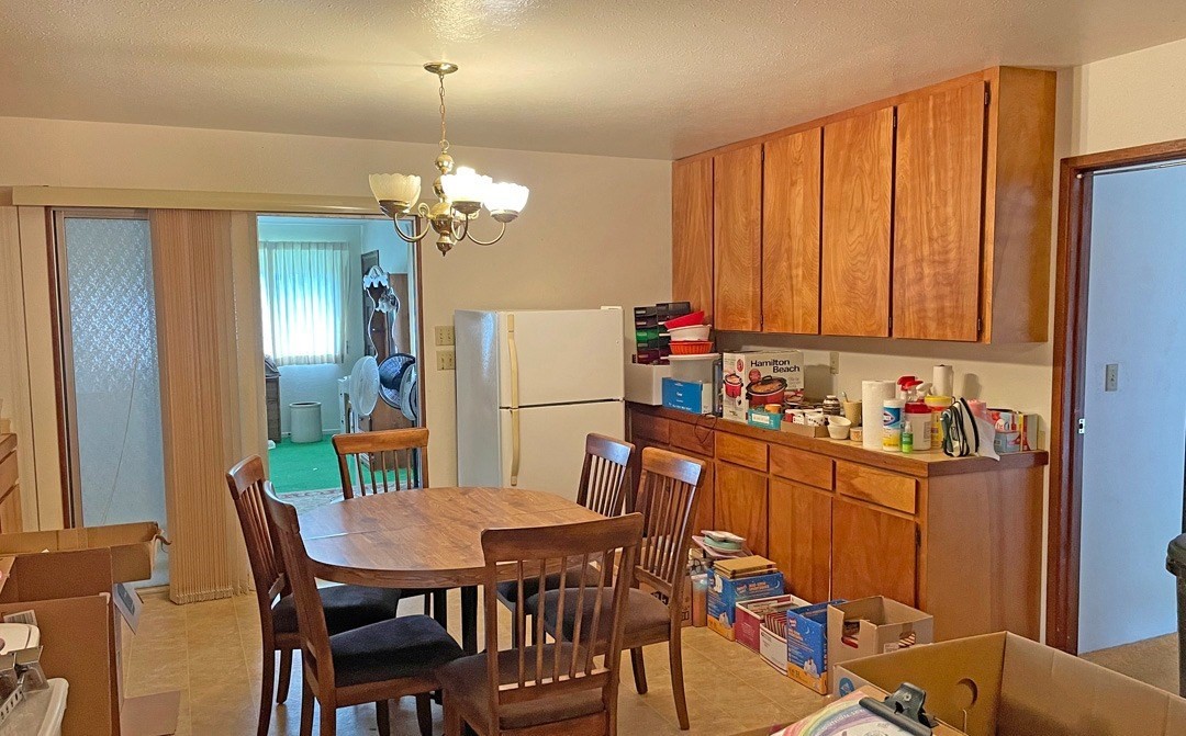 541 Hoaka Road Hilo, HI 96720 - Photo 7 of 9 a view of a dining room with furniture window and wooden floor