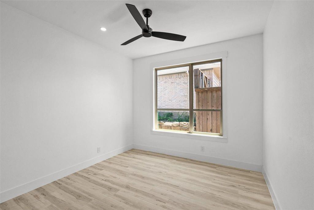 1017 Cedarcrest Drive Mesquite, TX 75149 - Photo 17 of 20 a view of an empty room with a window