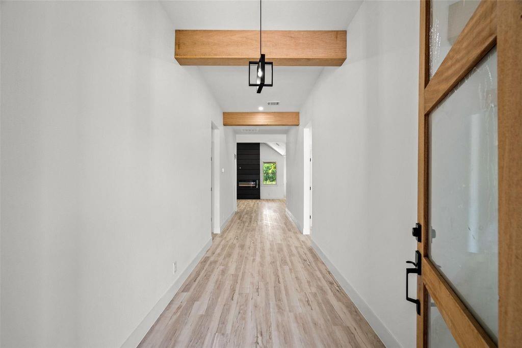 1017 Cedarcrest Drive Mesquite, TX 75149 - Photo 2 of 20 a view of hallway with wooden floor