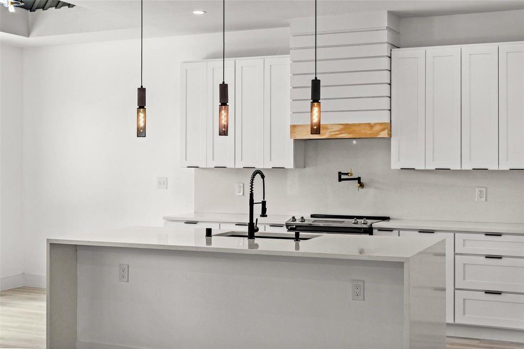 1017 Cedarcrest Drive Mesquite, TX 75149 - Photo 5 of 20 a view of kitchen with stainless steel appliances granite countertop a sink a stove and a refrigerator