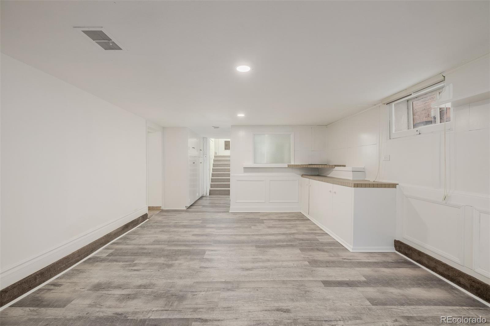 3534 Clay Street Denver, CO 80211 - Photo 34 of 50 a view of a kitchen with wooden floor