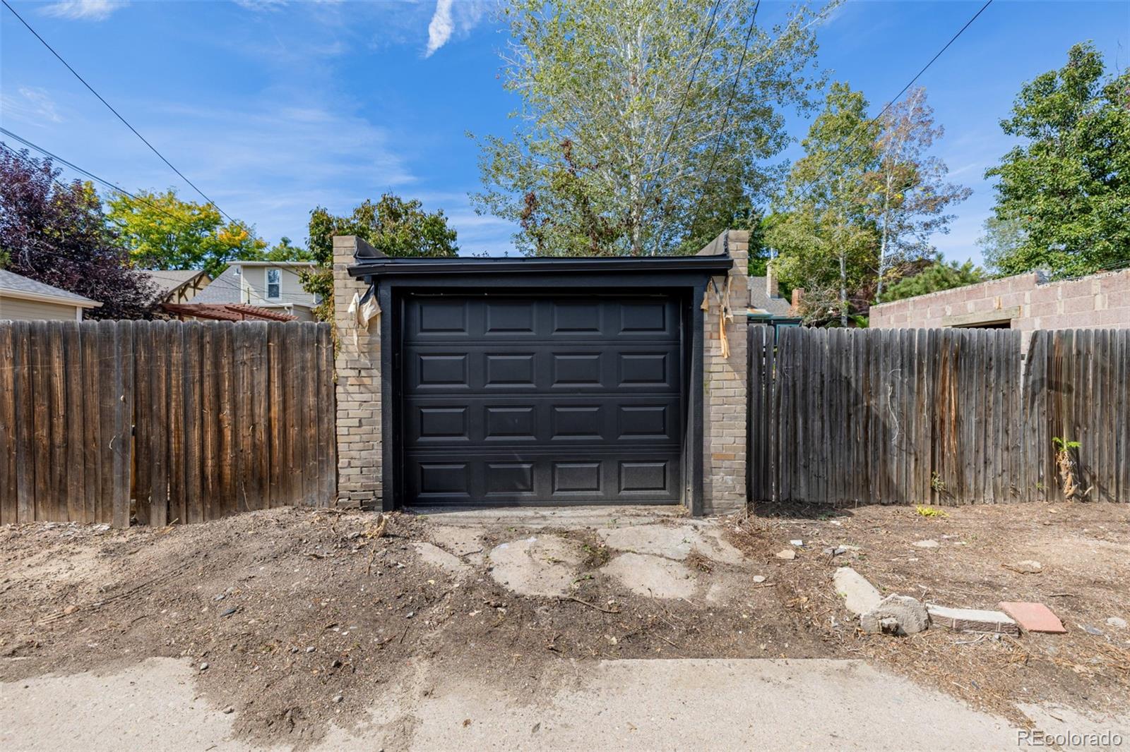 3534 Clay Street Denver, CO 80211 - Photo 41 of 50 a front view of a house with a fence