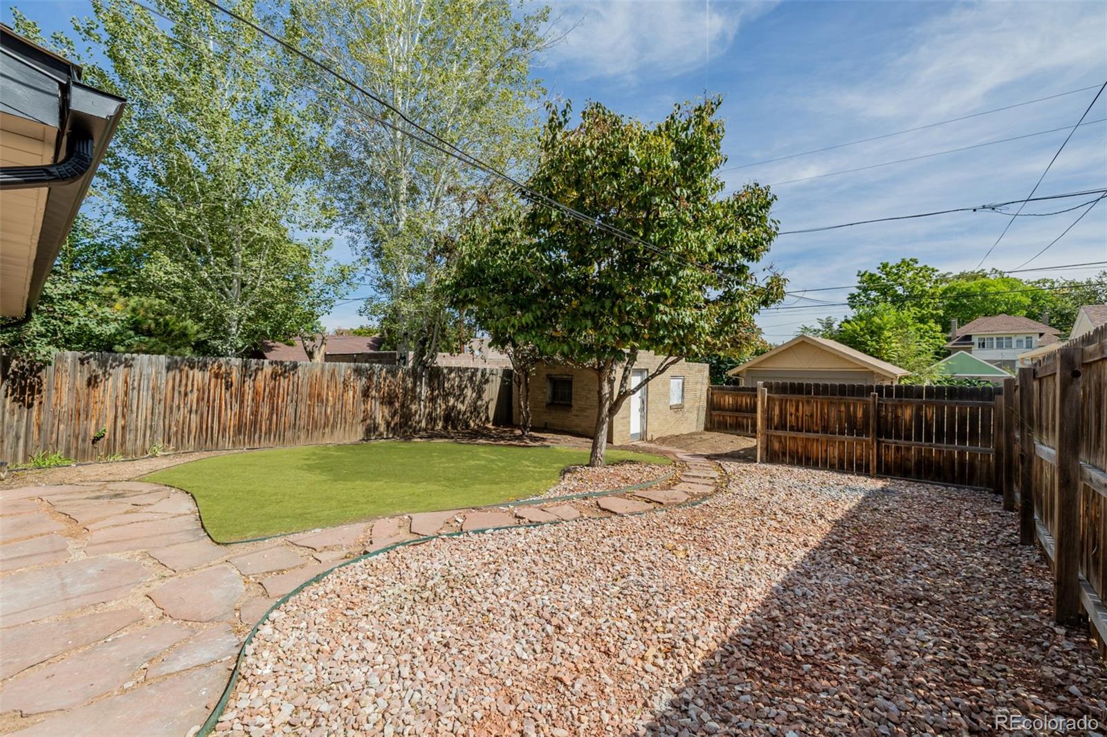 3534 Clay Street Denver, CO 80211 - Photo 44 of 50 a house with a tree in front of it