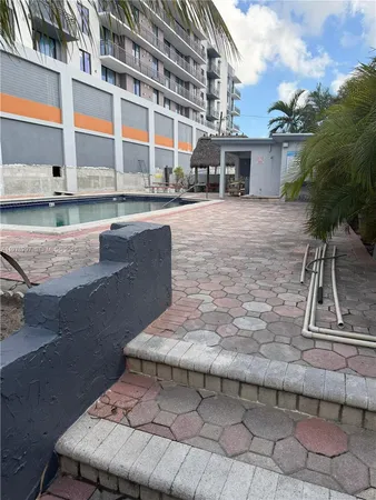 a view of residential houses with outdoor space