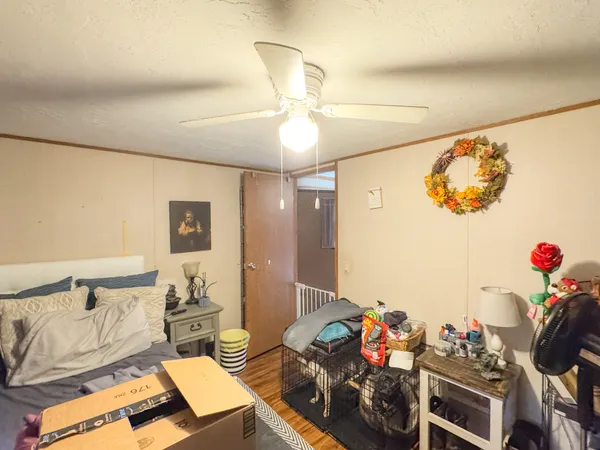 a bedroom with furniture and a bed