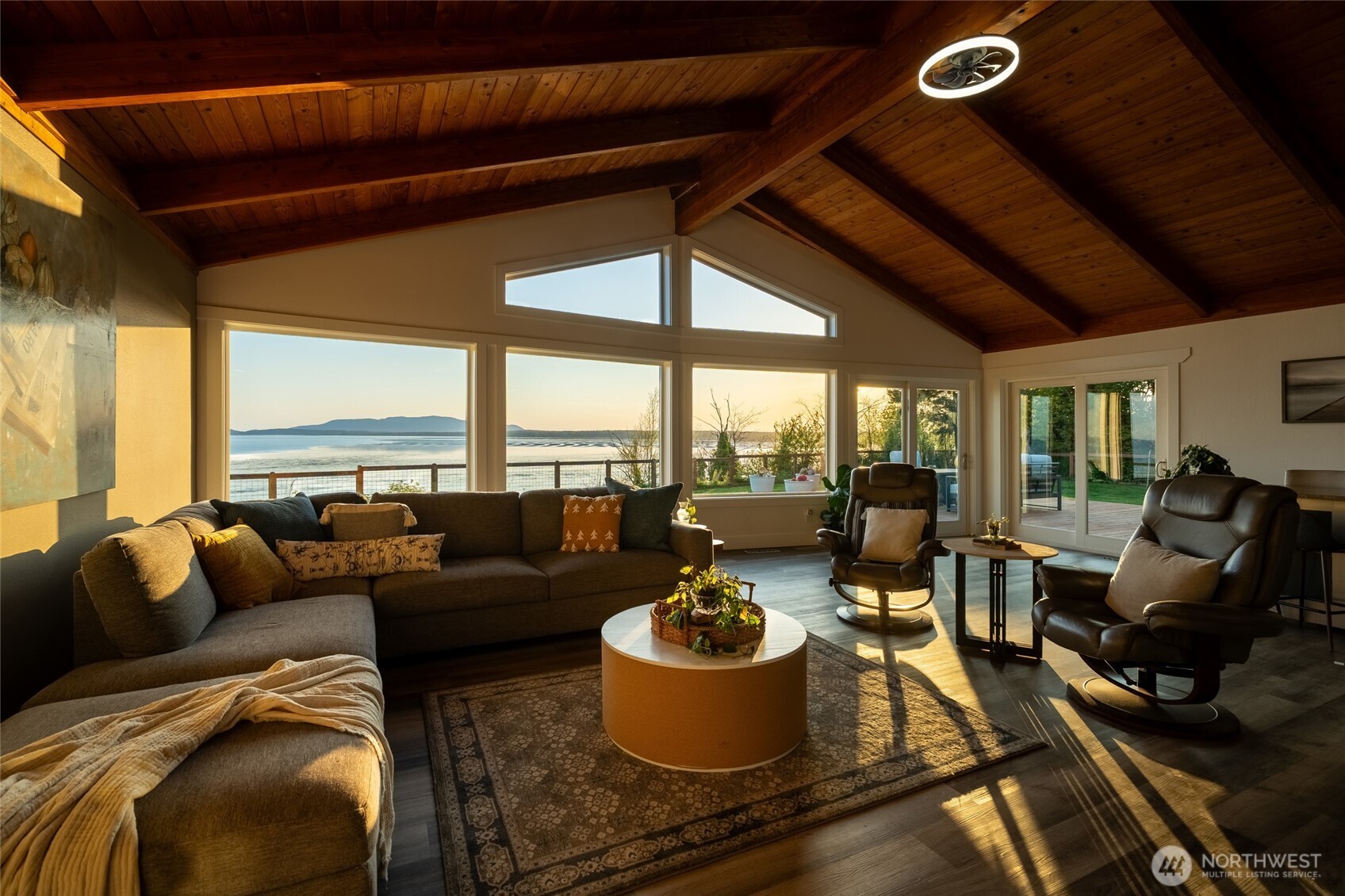 3161 Locust Avenue Bellingham, WA 98225 - Photo 1 of 40 a living room with furniture and a floor to ceiling window
