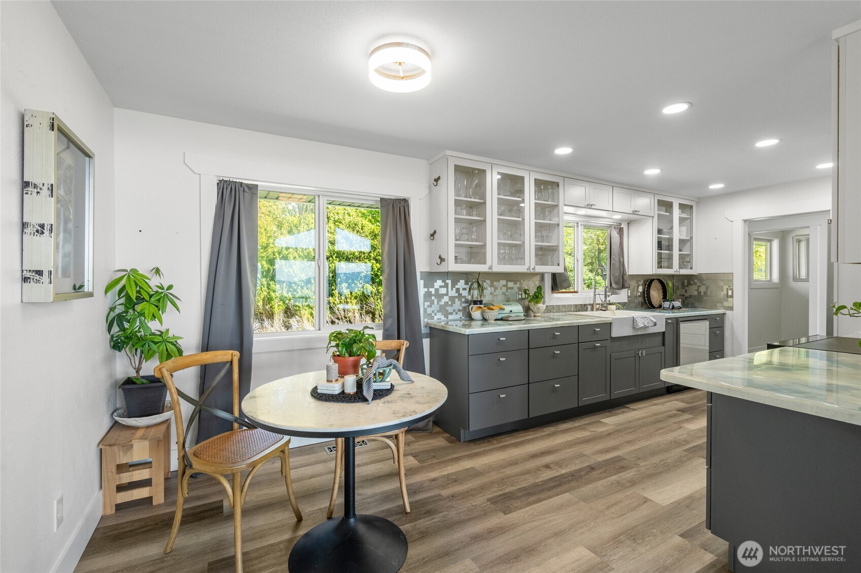 3161 Locust Avenue Bellingham, WA 98225 - Photo 13 of 40 a kitchen with a table and chairs in it