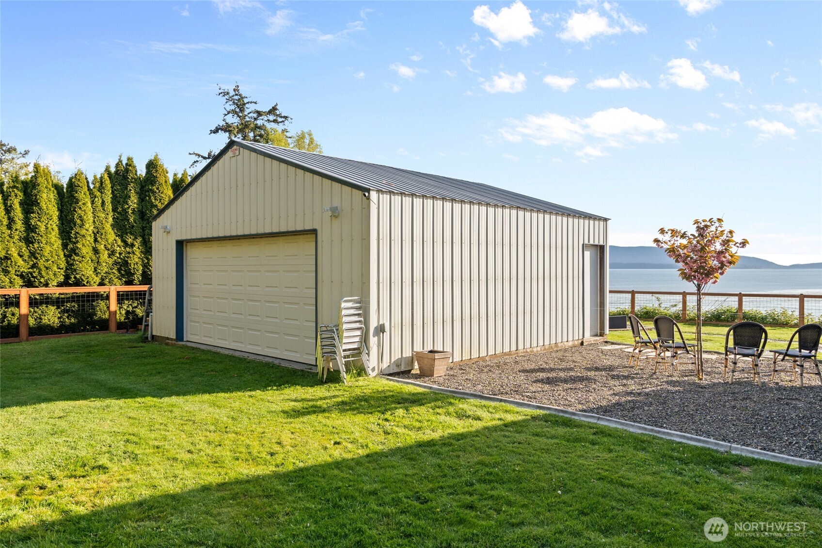 3161 Locust Avenue Bellingham, WA 98225 - Photo 30 of 40 a front view of a house with a garden and yard
