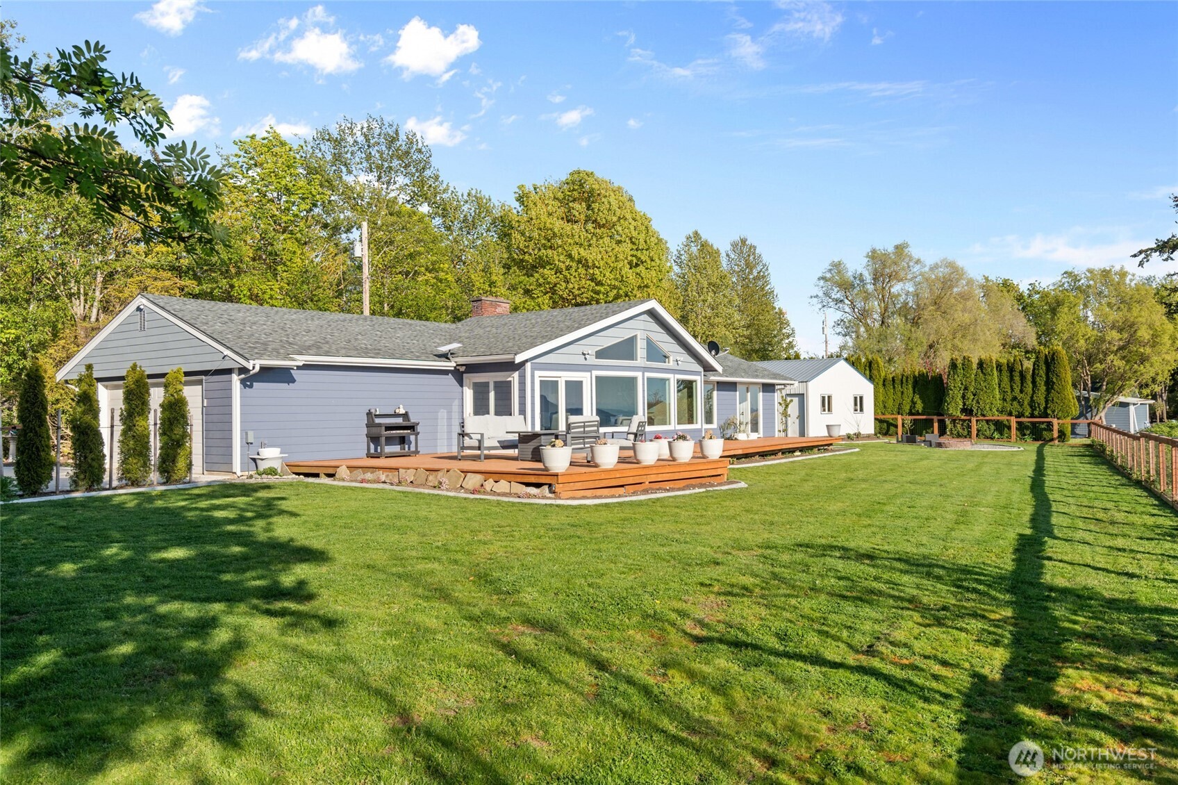 3161 Locust Avenue Bellingham, WA 98225 - Photo 33 of 40 a front view of a house with yard and green space