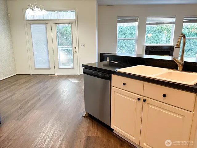 a view of a room & wooden floor