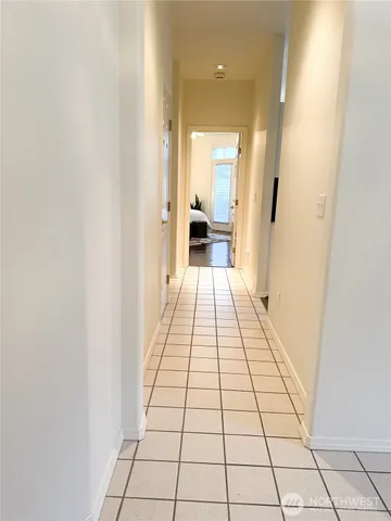 a bathroom with a double vanity sink and mirror