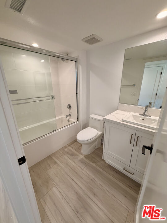 121 East 223rd Street, Unit 4 Carson, CA 90745 - Photo 12 of 14 a bathroom with a sink a toilet and a shower