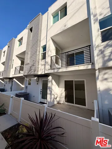 a front view of a house with balcony