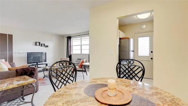 a view of a livingroom with furniture and a couch