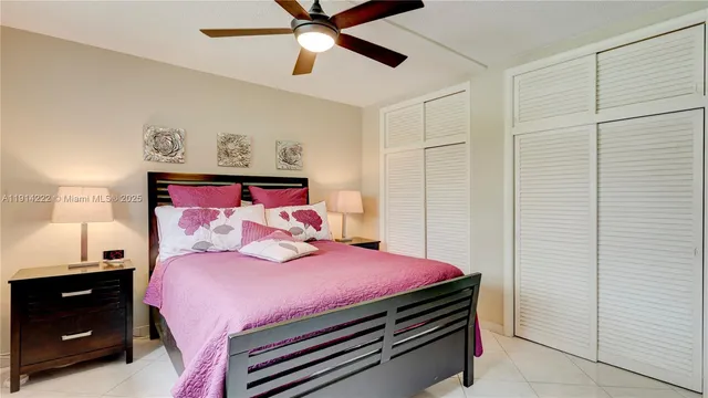 a bedroom with a bed and a closet