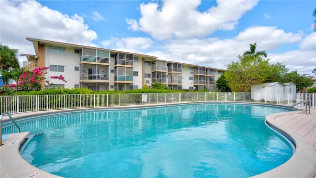 a view of a street with houses on both side