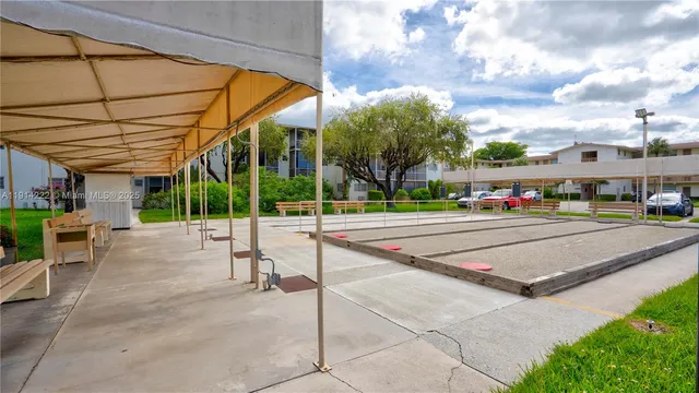 a view of a building with a garden