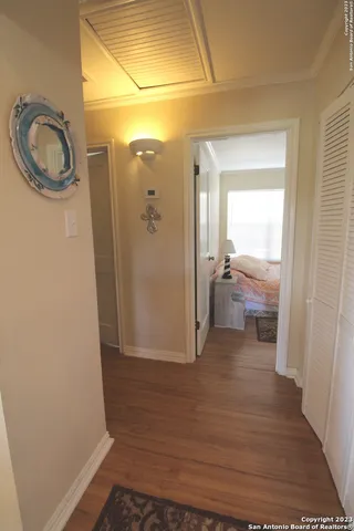 a view of bathroom with a sink and a mirror