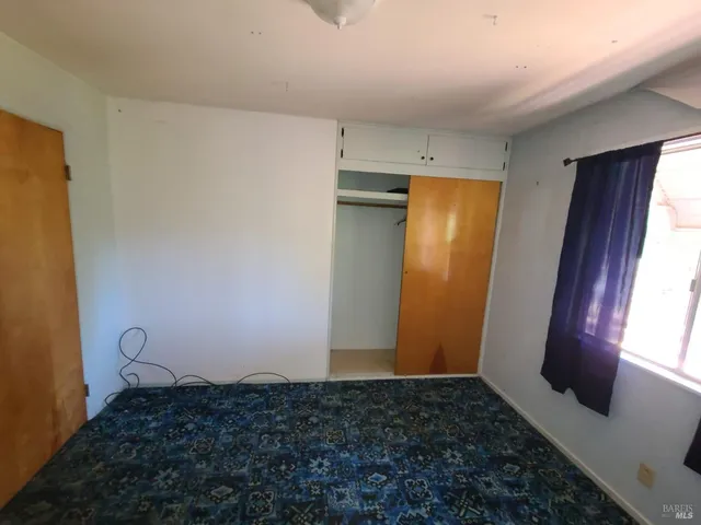 a view of a lounge chair in the patio