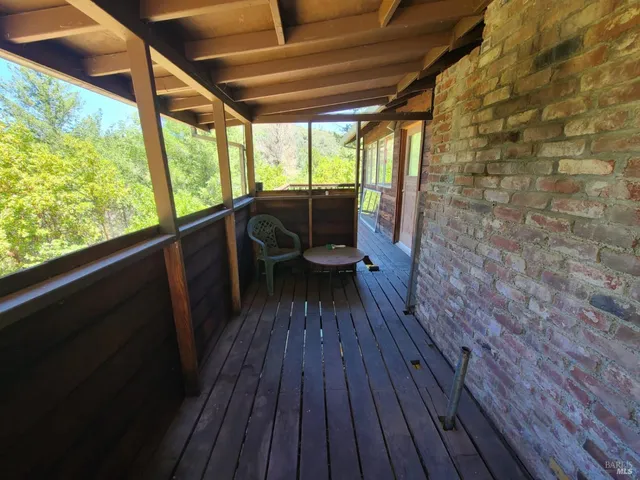 a view of a wooden roof deck