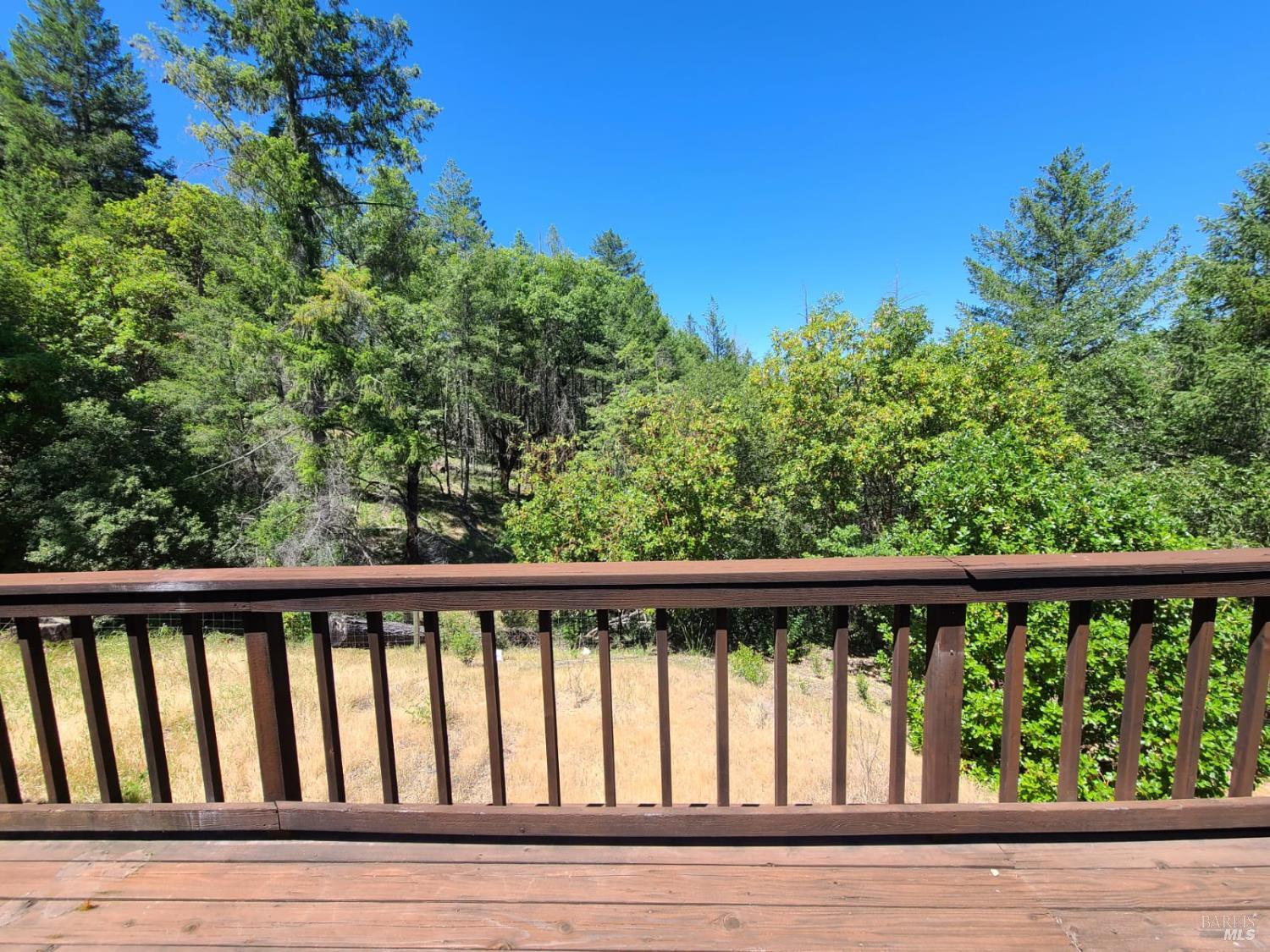 3620 Eel River Ranch Road Covelo, CA 95428 - Photo 16 of 27 a view of a wooden roof deck