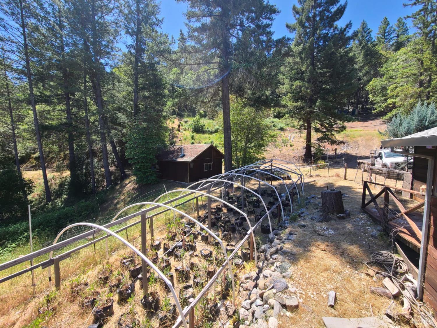 3620 Eel River Ranch Road Covelo, CA 95428 - Photo 19 of 27 a view of a backyard with sitting area