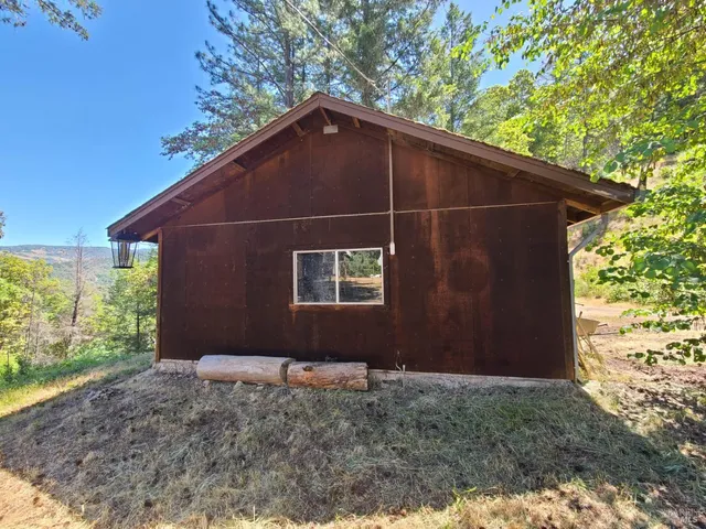 a view of a garage with wooden floors