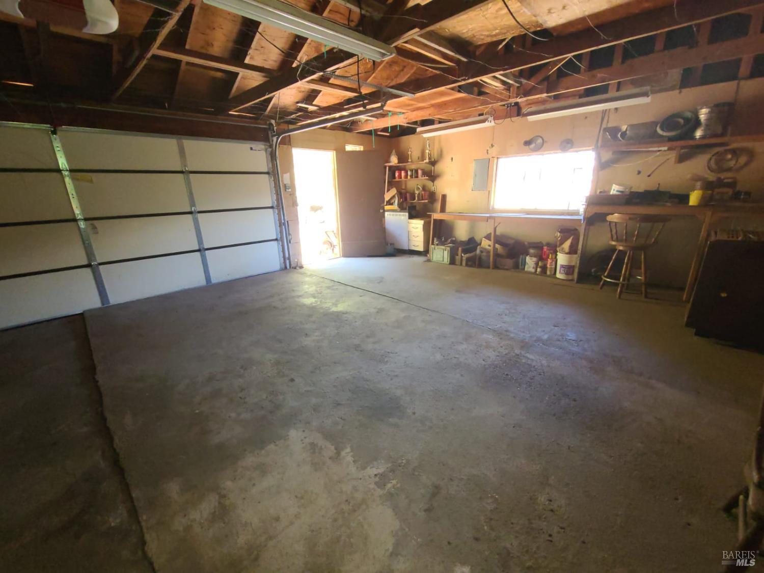 3620 Eel River Ranch Road Covelo, CA 95428 - Photo 25 of 27 a view of a garage with wooden floors