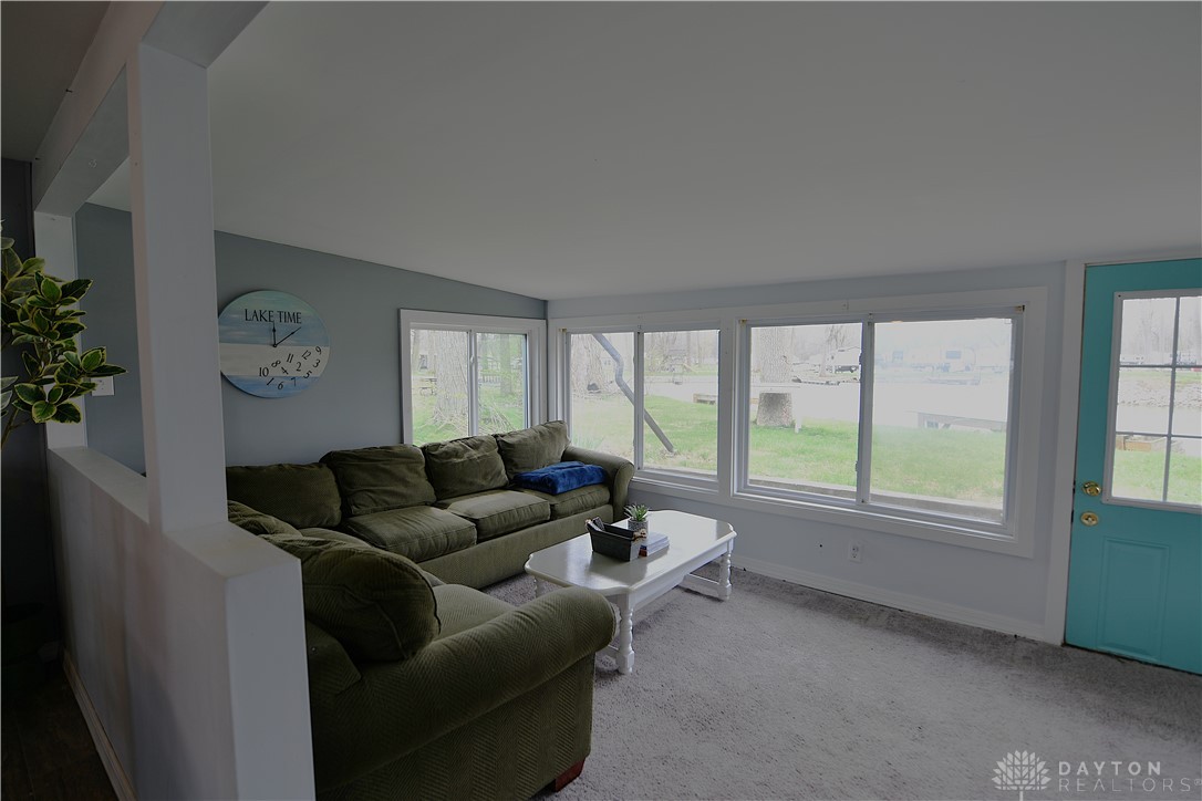 5445 Behm Road, Unit 15 Celina, OH 45822 - Photo 12 of 49 This bright living room offers an inviting space with expansive windows for abundant natural light.