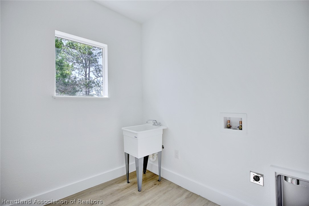 4307 Talbot Street Sebring, FL 33872 - Photo 16 of 19 a view of entryway with a window