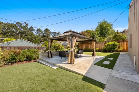 a view of a house with entertaining space
