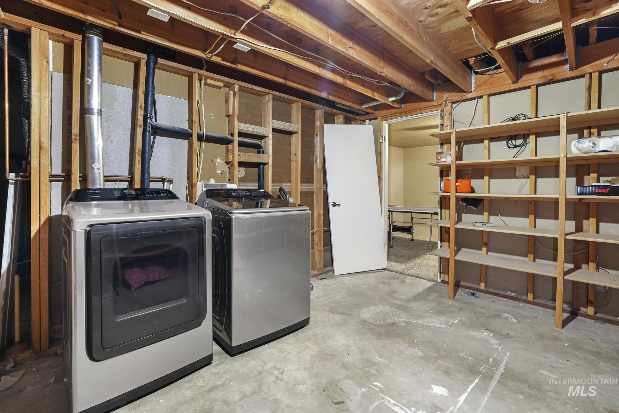 721 Beta Circle Twin Falls, ID 83301 - Photo 24 of 28 Unfinished basement with washing machine and dryer