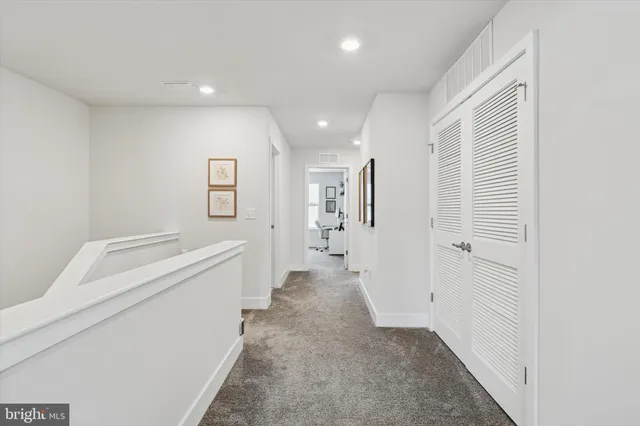 a view of entryway with white walls