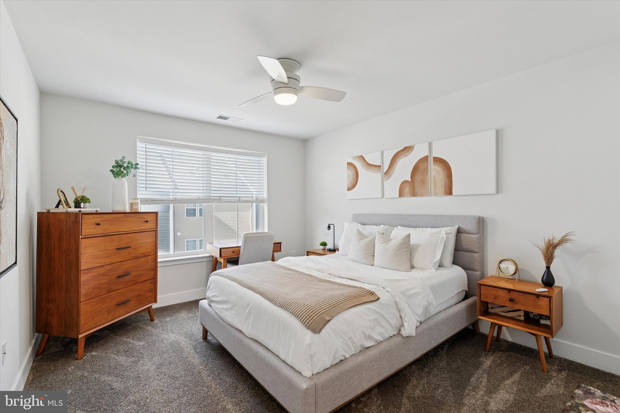 784 Ore Street Phoenixville, PA 19460 - Photo 18 of 30 a bedroom with a bed and a dresser